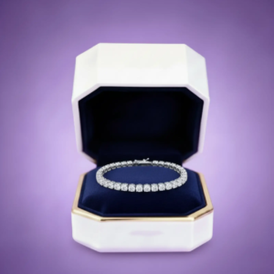 Diamond tennis bracelet presented in an elegant jewelry gift box on lilac background